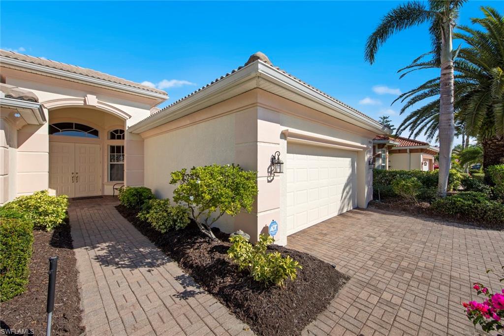 19924 Maddelena Circle Estero, FL 33967 - Photo 6 of 35 a view of a house with a yard