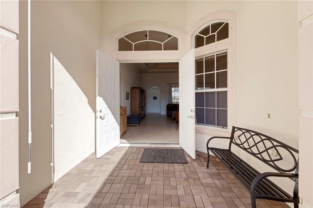 19924 Maddelena Circle Estero, FL 33967 - Photo 7 of 35 a view of a balcony with furniture and wooden floor