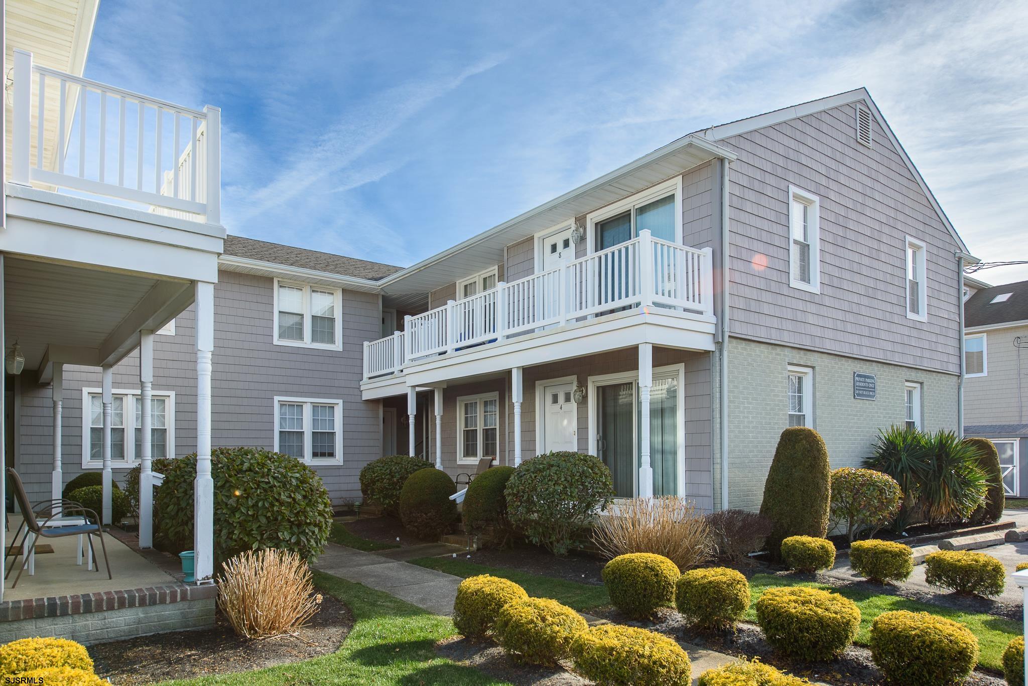 7 South Franklin Avenue, Unit 7 Margate City, NJ 08402 - Photo 14 of 16 a front view of a house with a yard