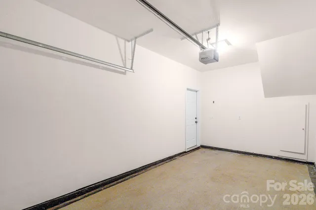 a view of storage and utility room with racks on the wall