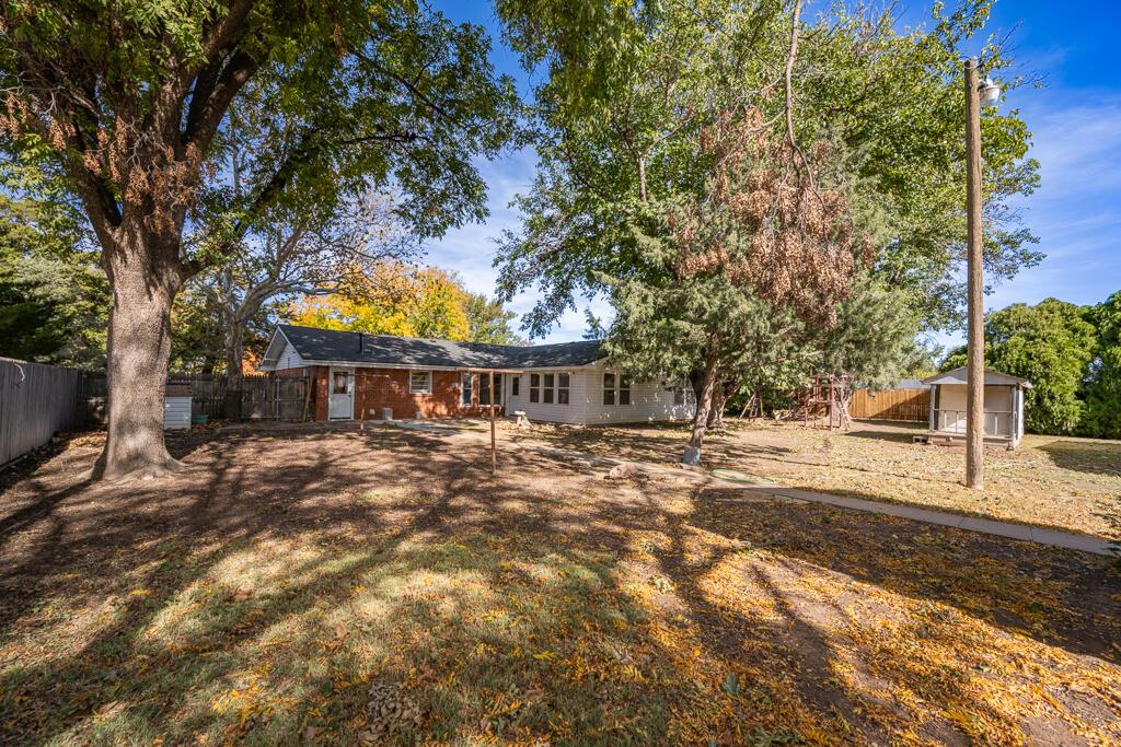 4231 Camp Lane Amarillo, TX 79110 - Photo 32 of 36 a view of a trees with yard