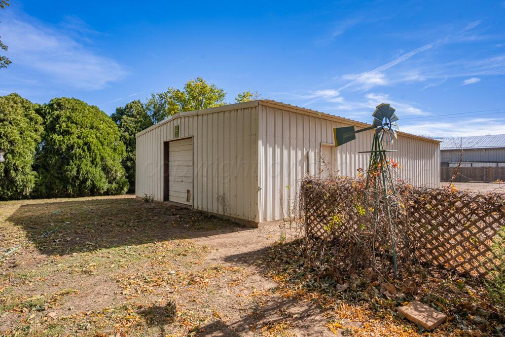 4231 Camp Lane Amarillo, TX 79110 - Photo 34 of 36 a front view of a house with a yard