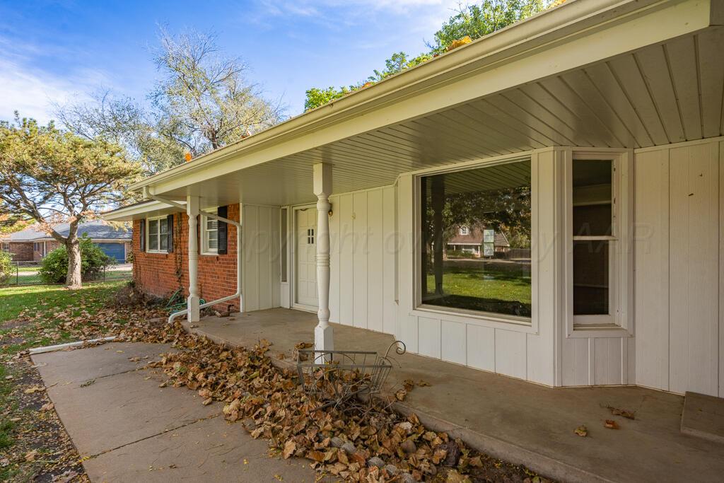 4231 Camp Lane Amarillo, TX 79110 - Photo 4 of 36 a front view of a house with a yard