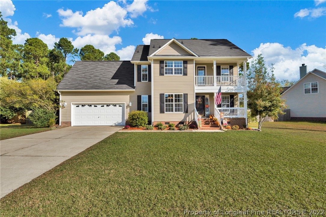 67 Chesapeake Road Cameron, NC 28326 - Photo 1 of 40 a front view of a house with garden
