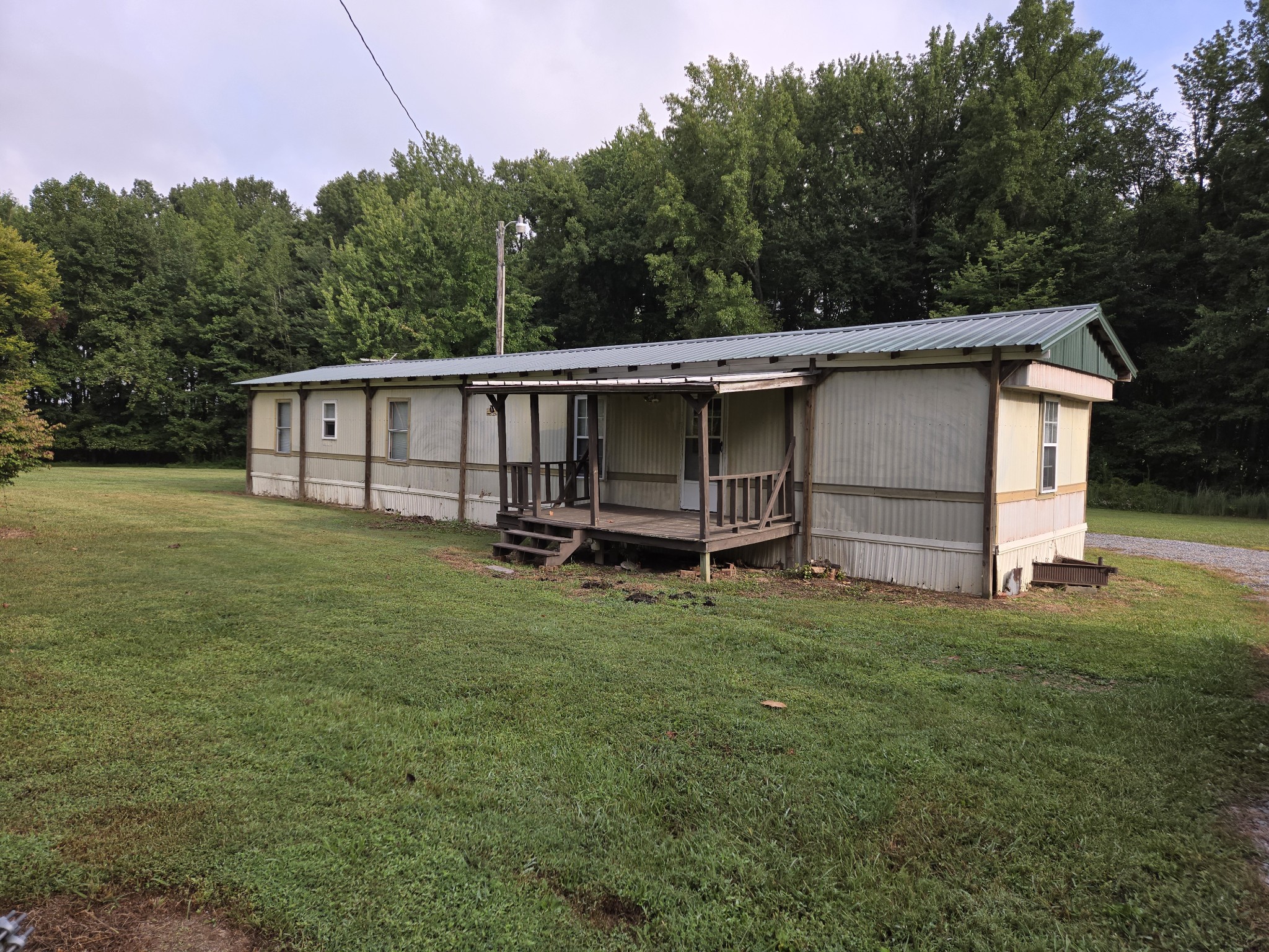2550 Friendship Road Cross Plains, TN 37049 - Photo 1 of 4 a view of a house with backyard and backyard