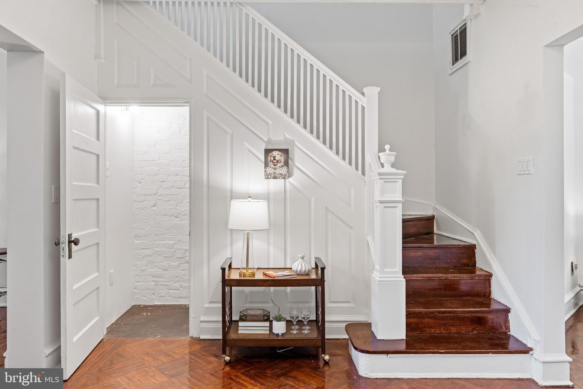 2530 13th Street Northwest Washington, DC 20009 - Photo 16 of 33 a view of entryway and hall with wooden floor