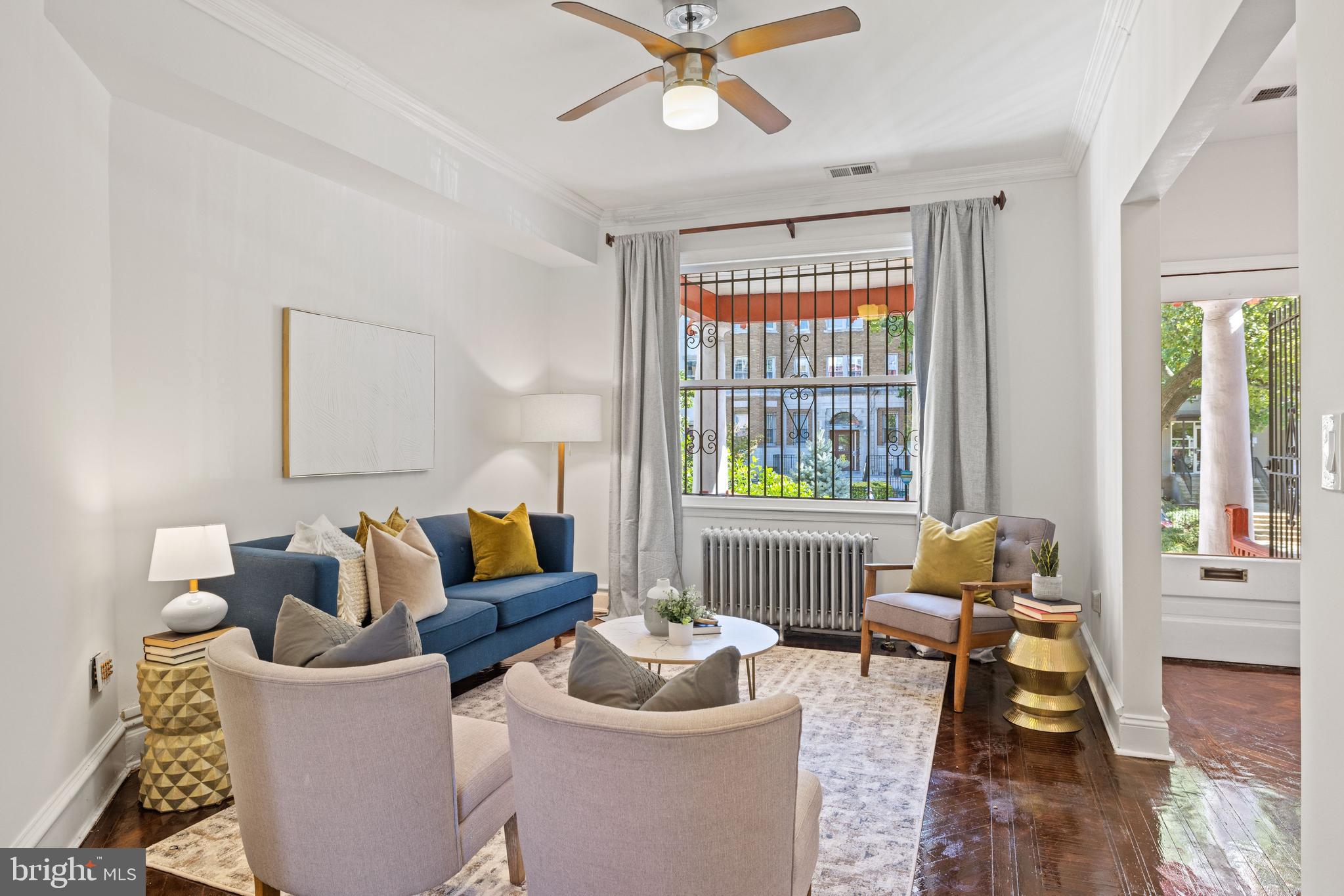 2530 13th Street Northwest Washington, DC 20009 - Photo 4 of 33 a living room with furniture and a window
