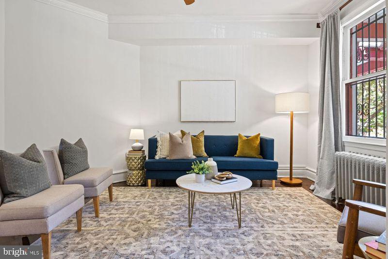 2530 13th Street Northwest Washington, DC 20009 - Photo 5 of 33 a living room with furniture and a table