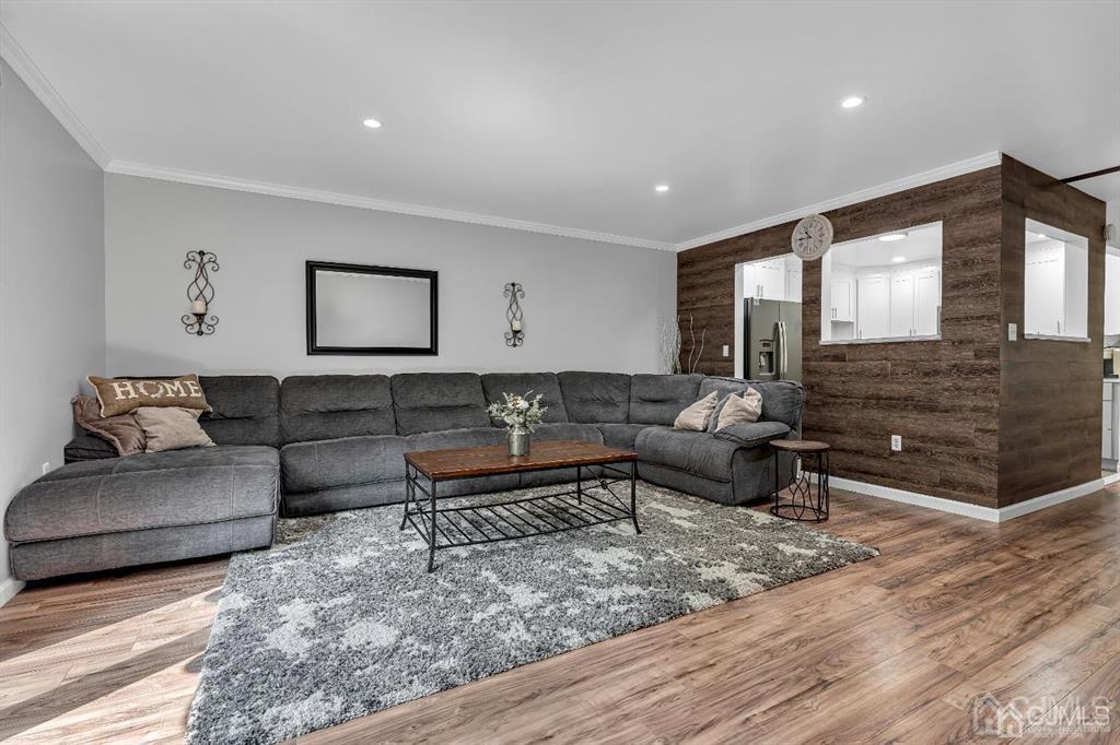 21 Bramble Lane Old Bridge, NJ 07747 - Photo 16 of 35 a living room with furniture and a rug