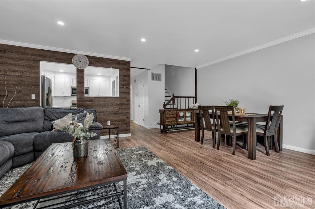 21 Bramble Lane Old Bridge, NJ 07747 - Photo 17 of 35 a living room with furniture a wooden floor and next to a rug