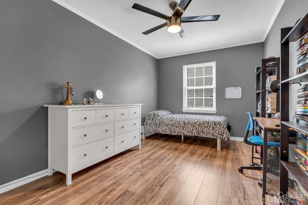 21 Bramble Lane Old Bridge, NJ 07747 - Photo 22 of 35 a bedroom with a bed and a window