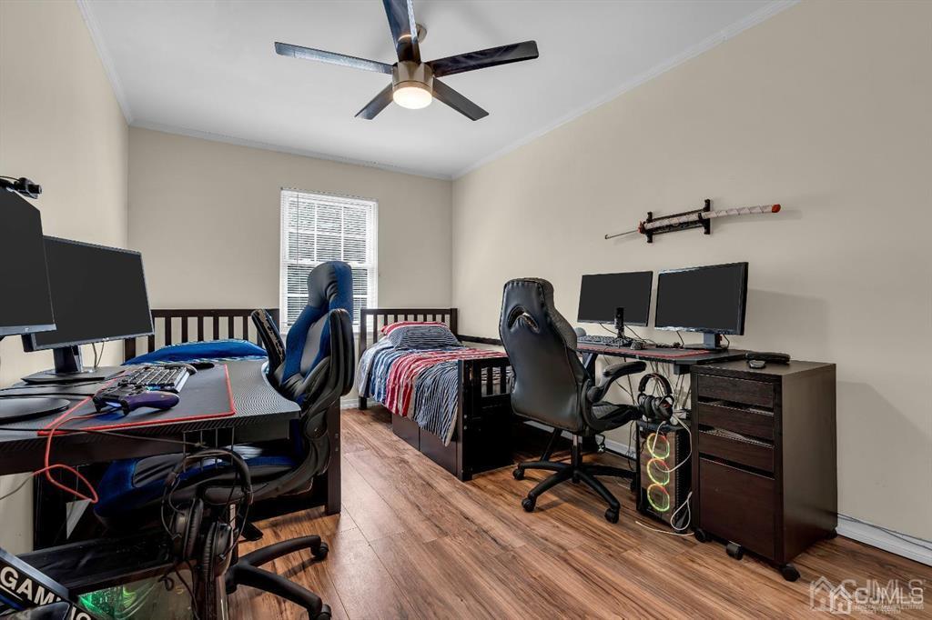 21 Bramble Lane Old Bridge, NJ 07747 - Photo 23 of 35 a workspace with furniture and wooden floor