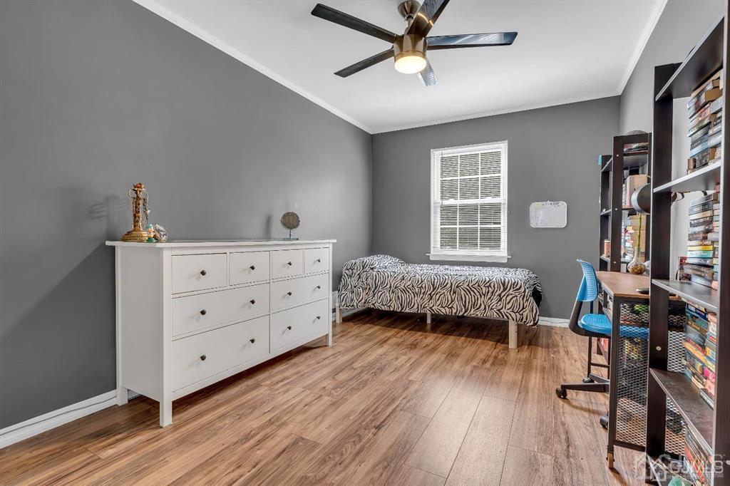21 Bramble Lane Old Bridge, NJ 07747 - Photo 25 of 35 a bedroom with a bed and wooden floor