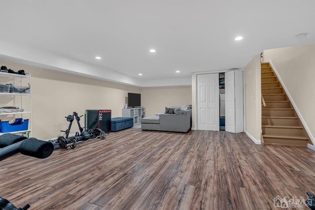 21 Bramble Lane Old Bridge, NJ 07747 - Photo 28 of 35 a large room with wooden floor and furniture