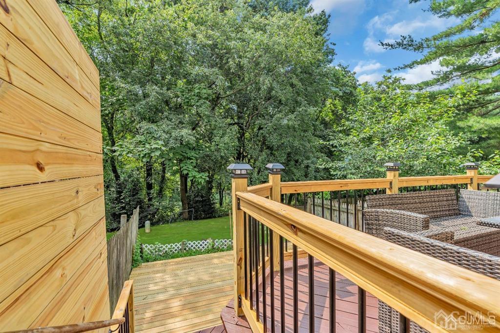 21 Bramble Lane Old Bridge, NJ 07747 - Photo 32 of 35 a view of balcony with wooden floor and fence