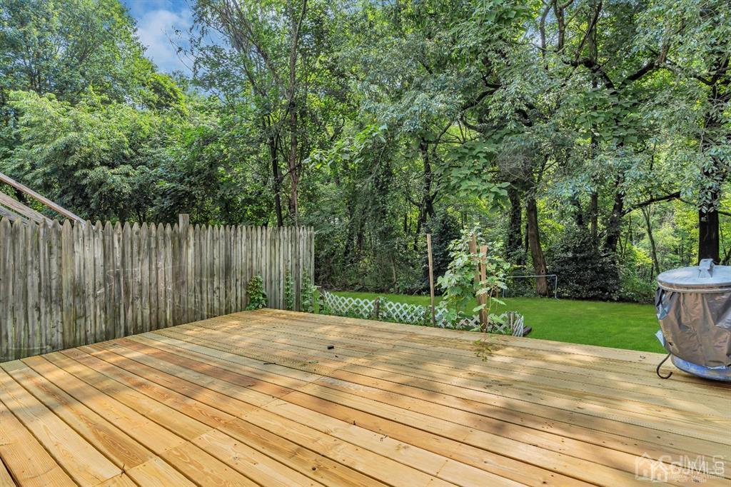 21 Bramble Lane Old Bridge, NJ 07747 - Photo 34 of 35 a backyard of a house with lots of green space
