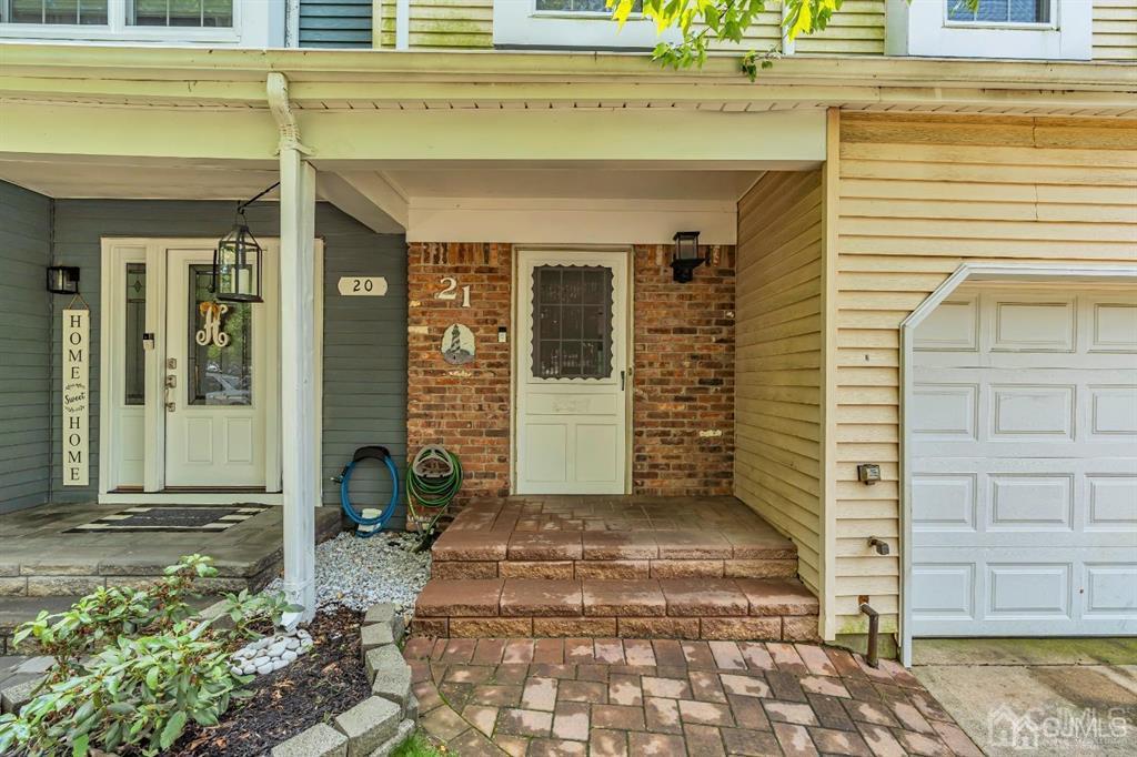 21 Bramble Lane Old Bridge, NJ 07747 - Photo 6 of 35 a view of a entrance door of the building
