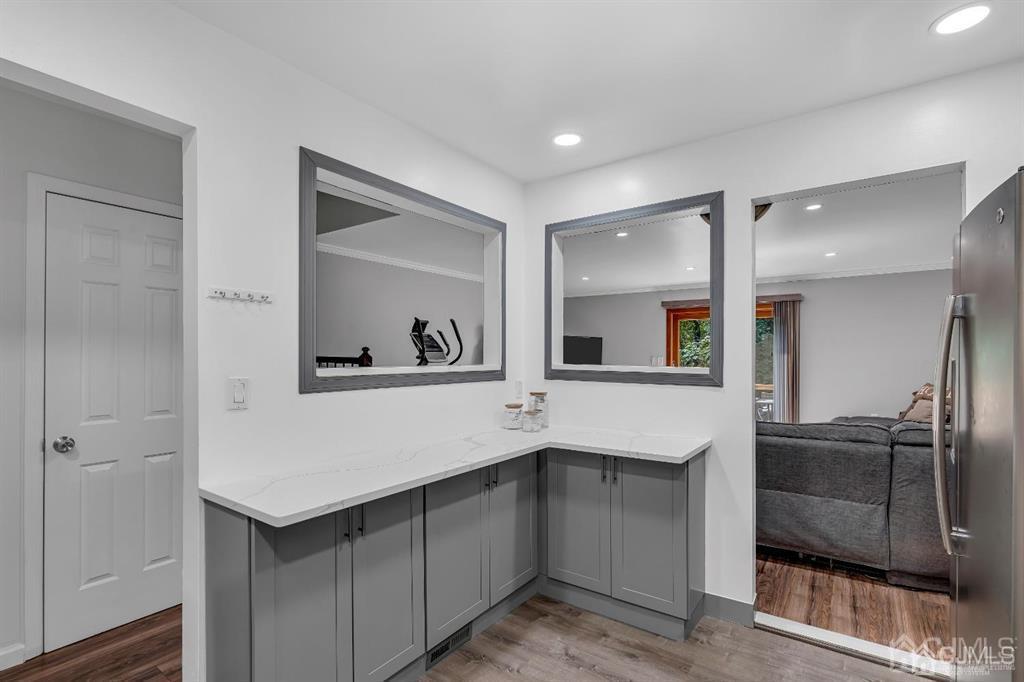 21 Bramble Lane Old Bridge, NJ 07747 - Photo 9 of 35 a kitchen with a sink and refrigerator