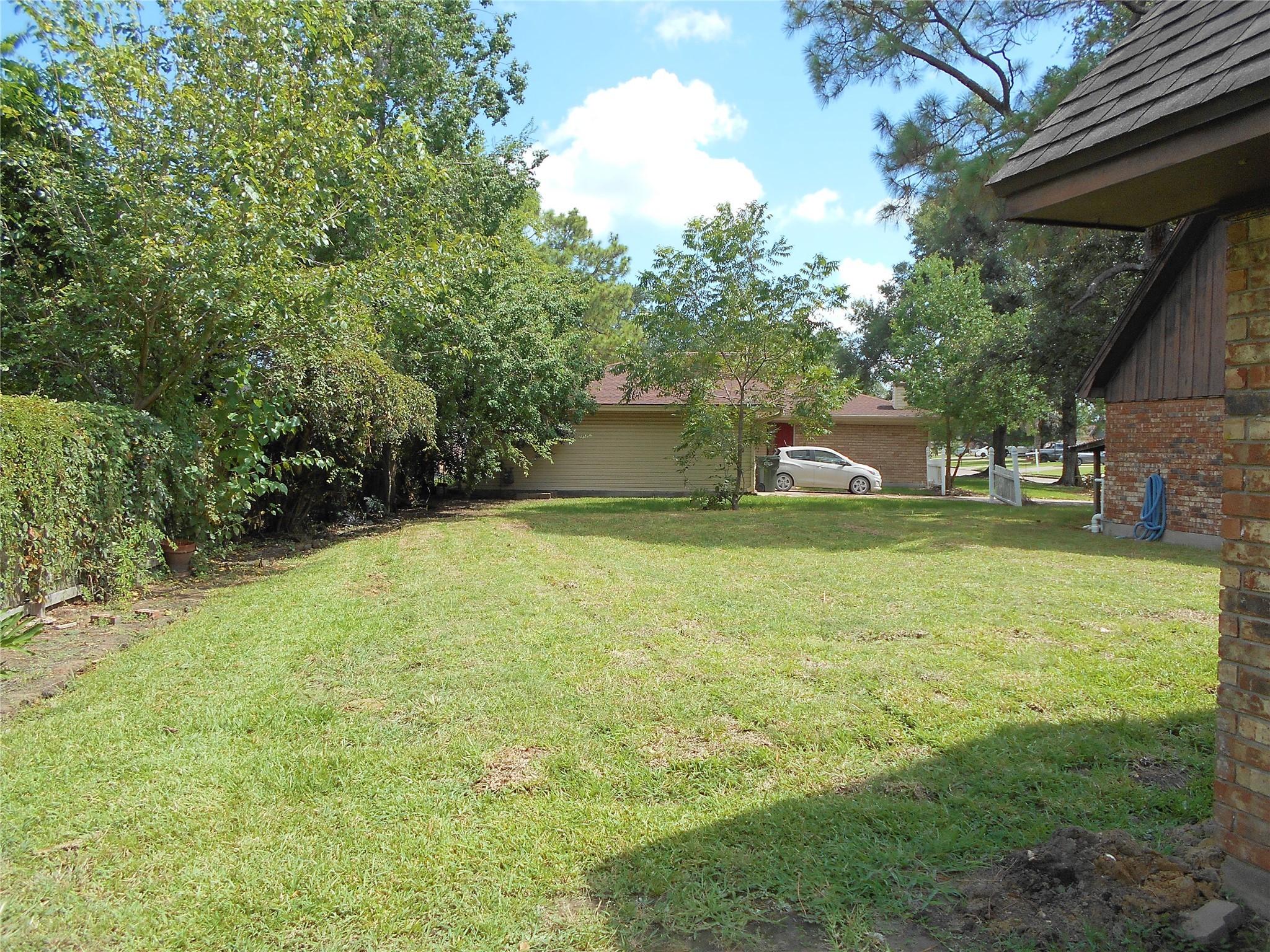 8600 Stonegate Court Port Arthur, TX 77642 - Photo 30 of 30 a view of a swimming pool with a yard
