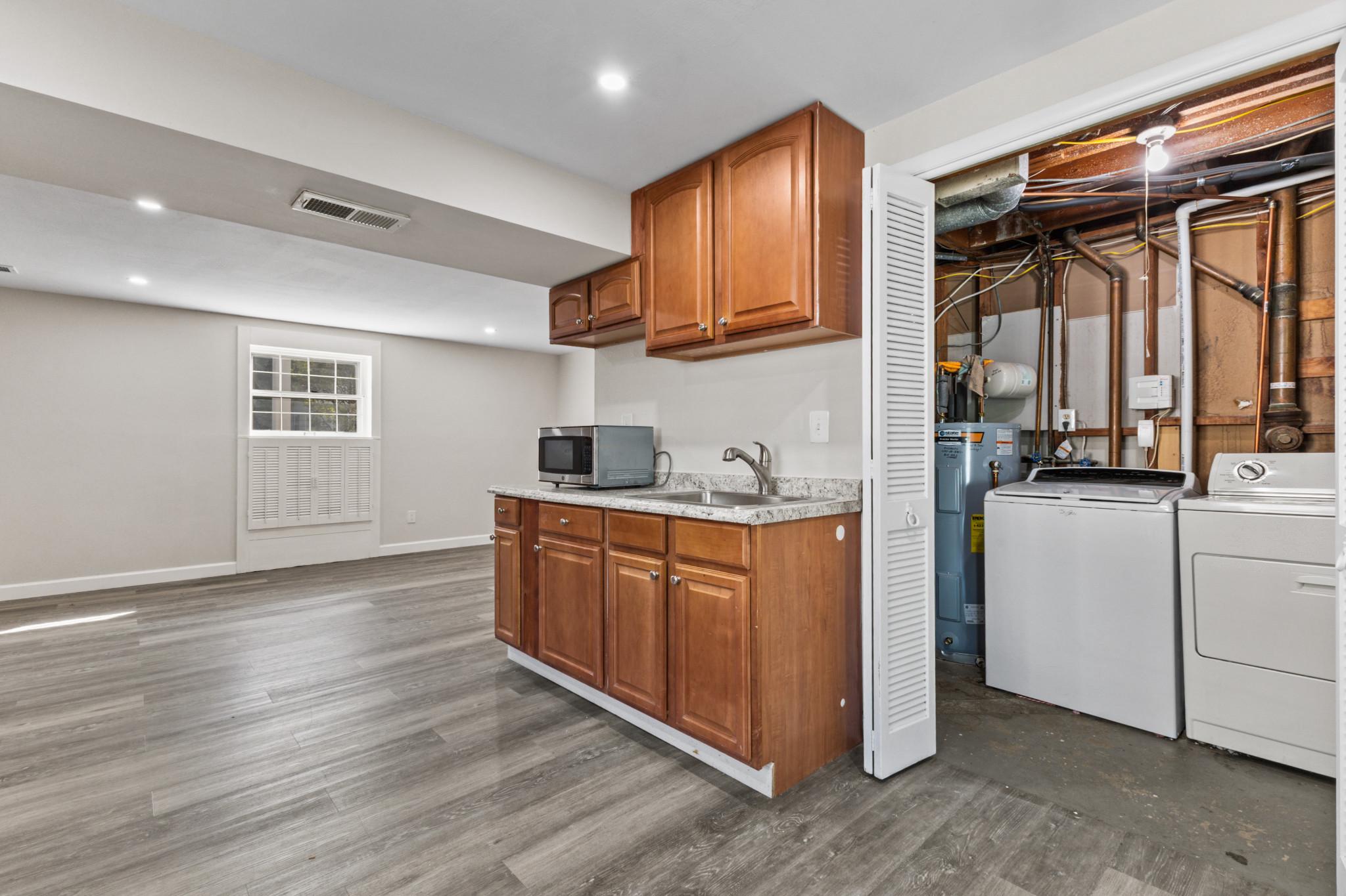 403 West Poplar Road Sterling, VA 20164 - Photo 17 of 25 Spacious basement with modern amenities.