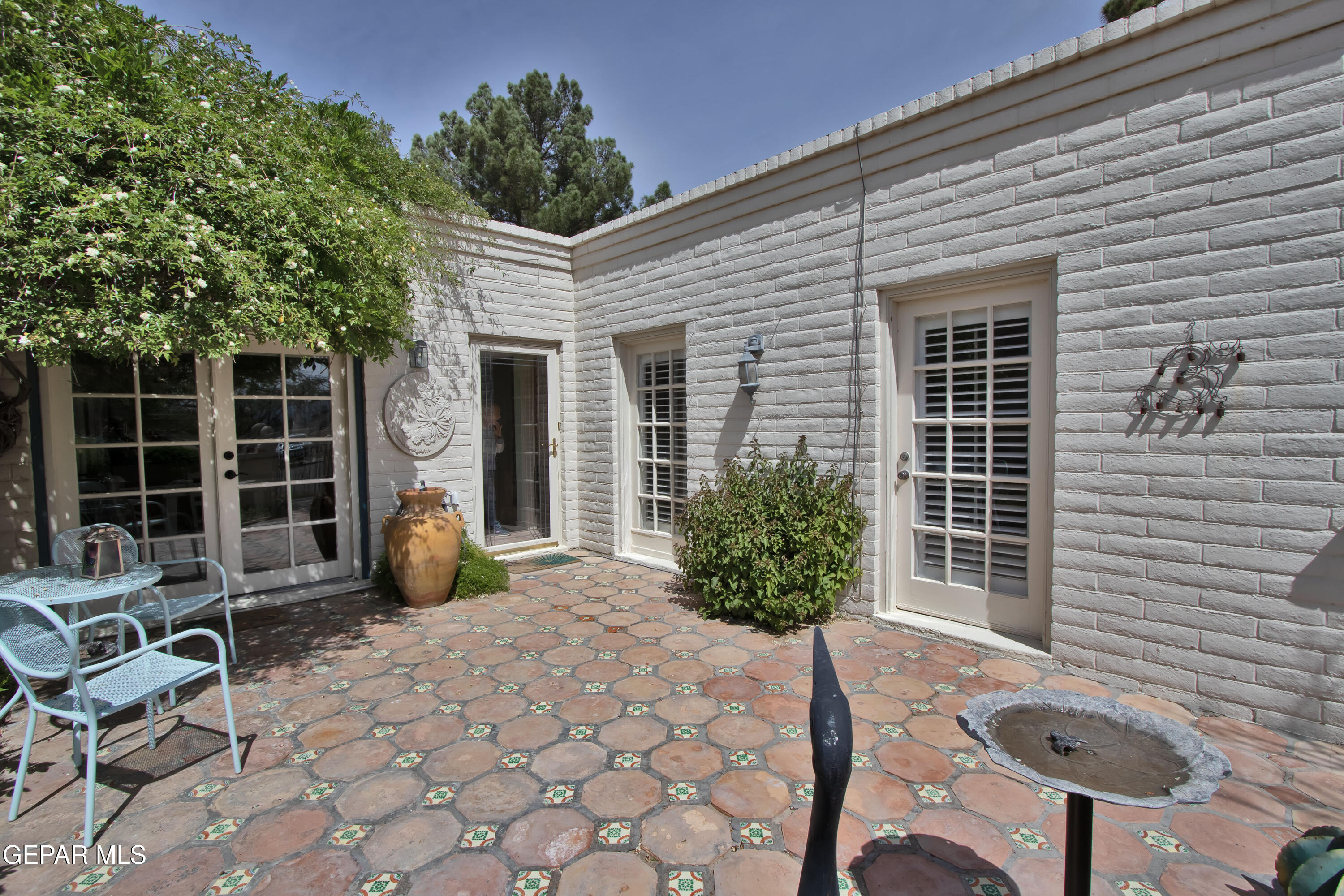 116 North Trevino Road Santa Teresa, NM 88008 - Photo 11 of 77 a view of a house with backyard and sitting area