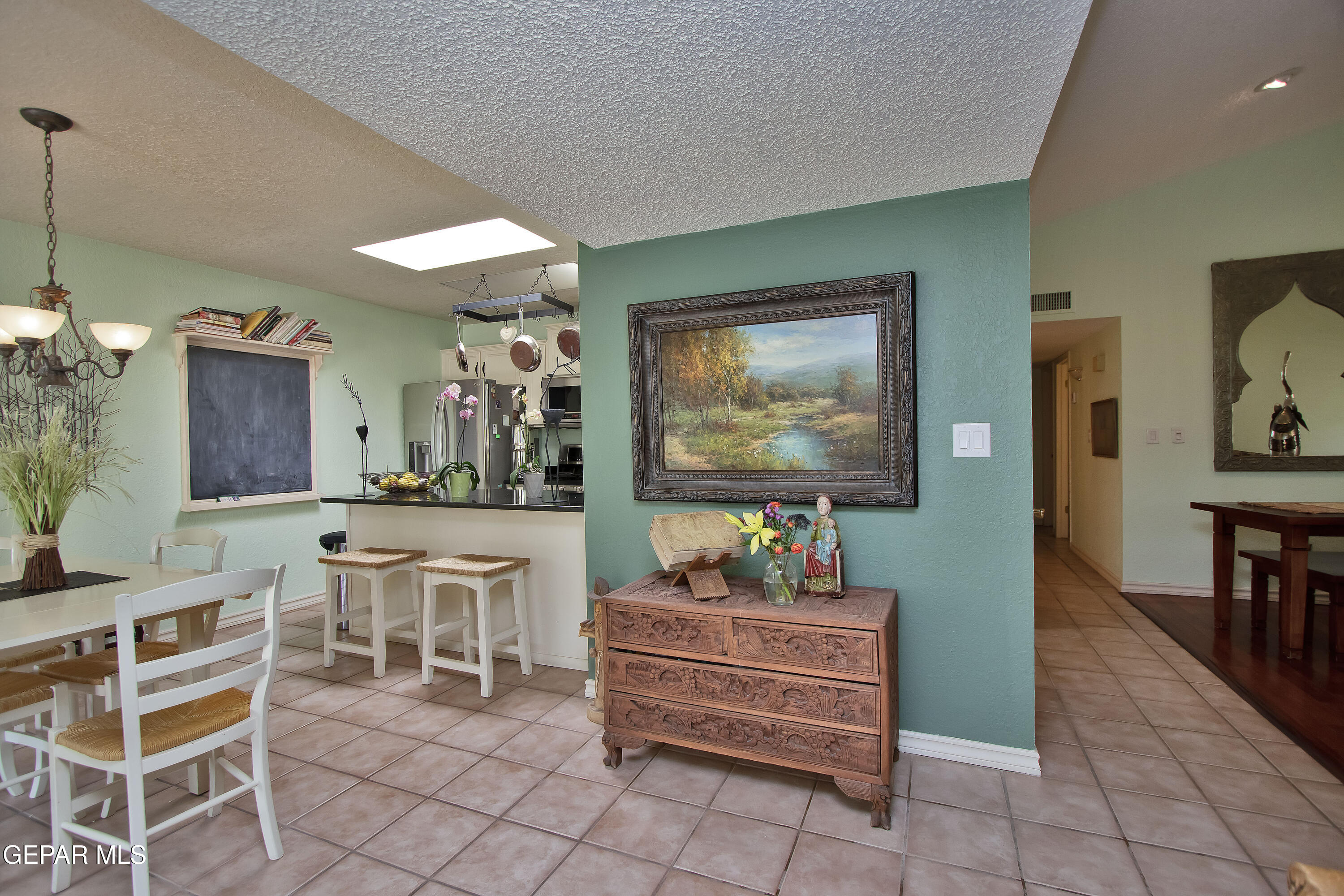 116 North Trevino Road Santa Teresa, NM 88008 - Photo 14 of 77 a room with furniture a air conditioner and a mirror
