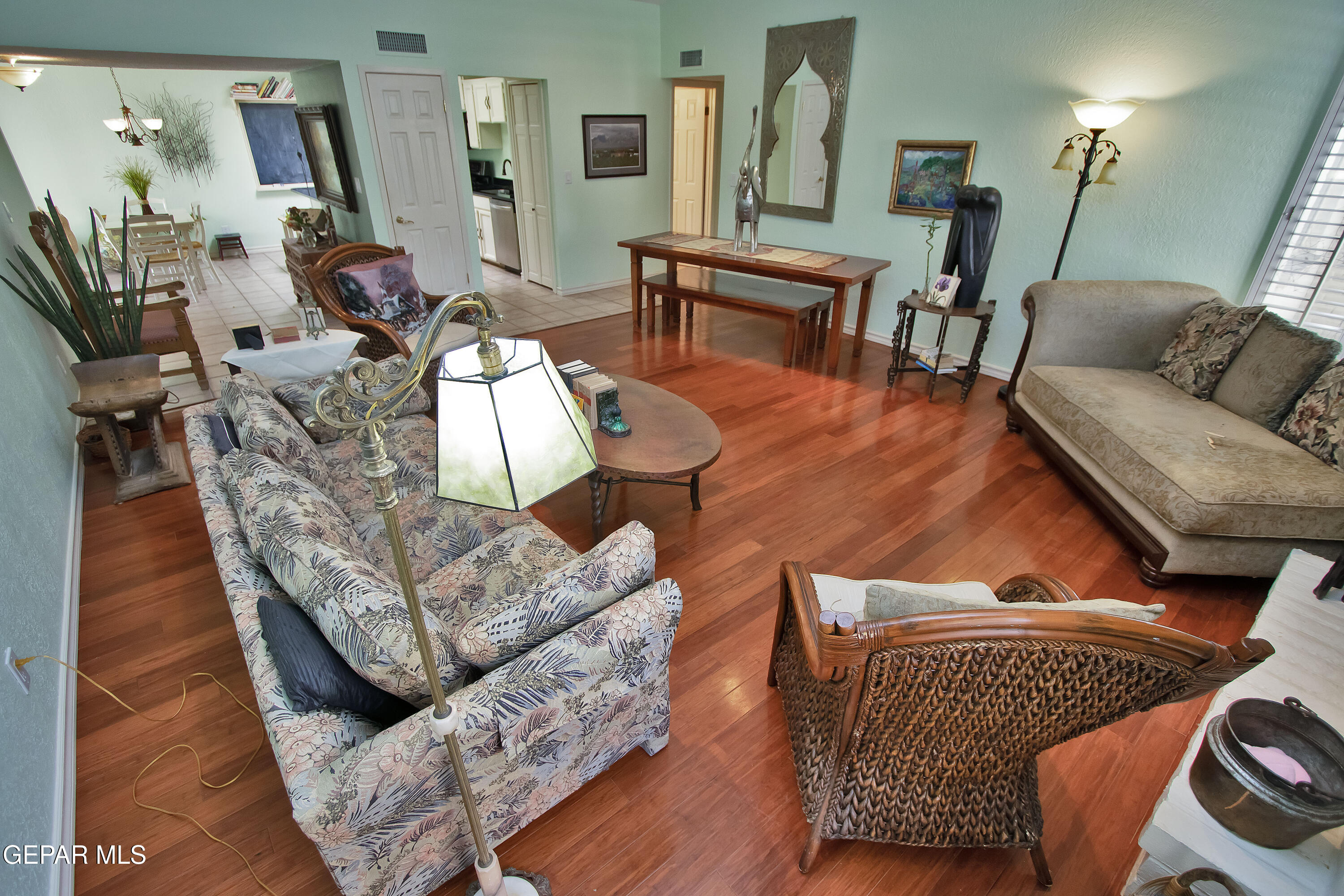 116 North Trevino Road Santa Teresa, NM 88008 - Photo 29 of 77 a living room with furniture and wooden floor