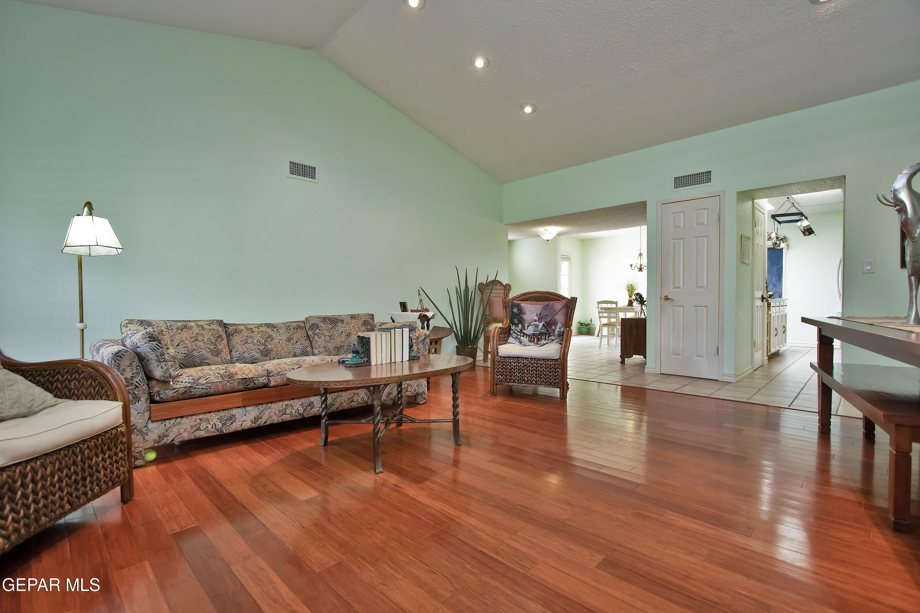 116 North Trevino Road Santa Teresa, NM 88008 - Photo 31 of 77 a living room with furniture and a wooden floor