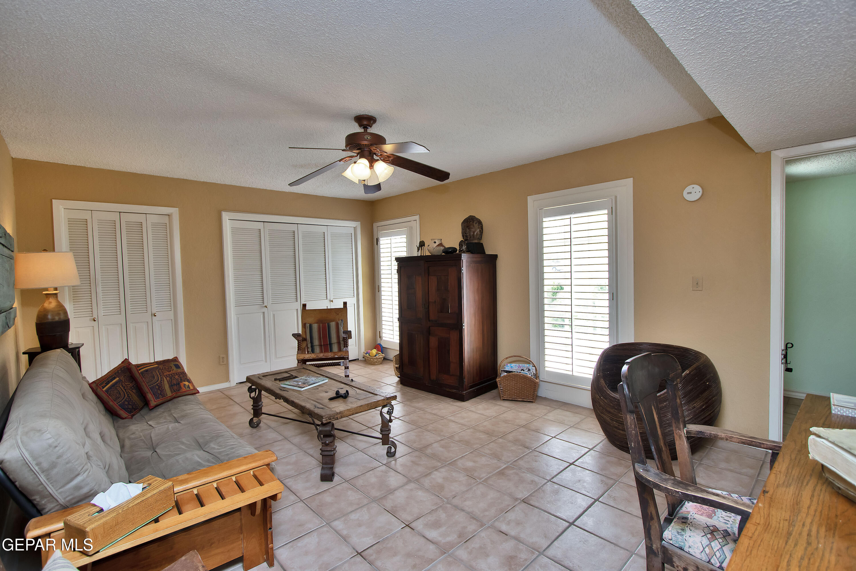 116 North Trevino Road Santa Teresa, NM 88008 - Photo 36 of 77 a living room with furniture and a window