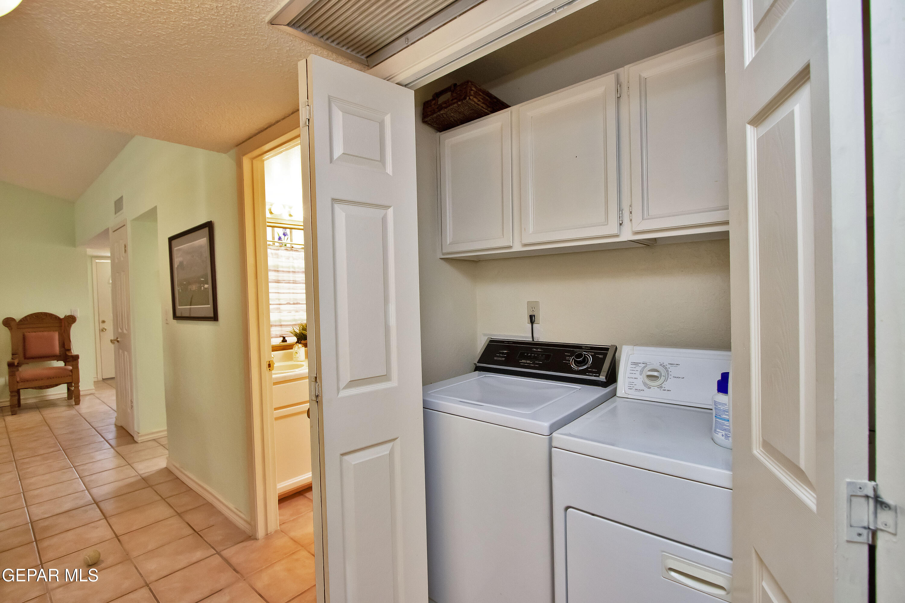 116 North Trevino Road Santa Teresa, NM 88008 - Photo 66 of 77 a utility room with dryer and washer