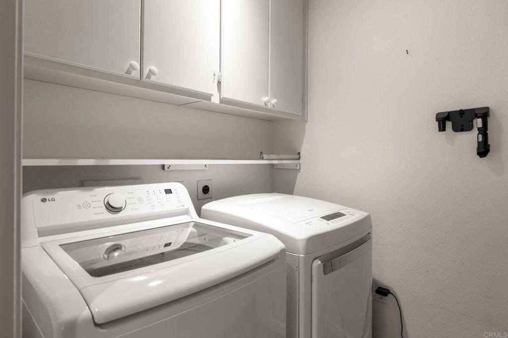 4939 Tilos Way Oceanside, CA 92056 - Photo 21 of 49 a utility room with dryer and washer
