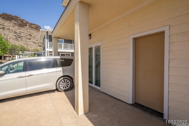 a view of cabinets a sink and wooden floor