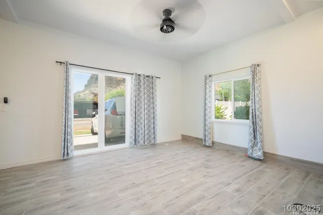 a kitchen with a sink a stove and cabinets