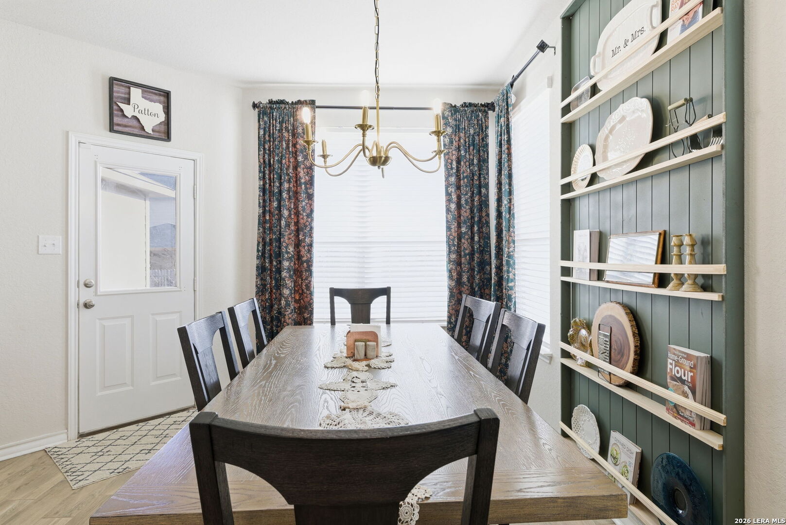3410 Copper Acres Bulverde, TX 78163 - Photo 17 of 50 a view of a dining room with furniture window and wooden floor