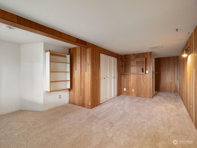 a room with storage and utility room