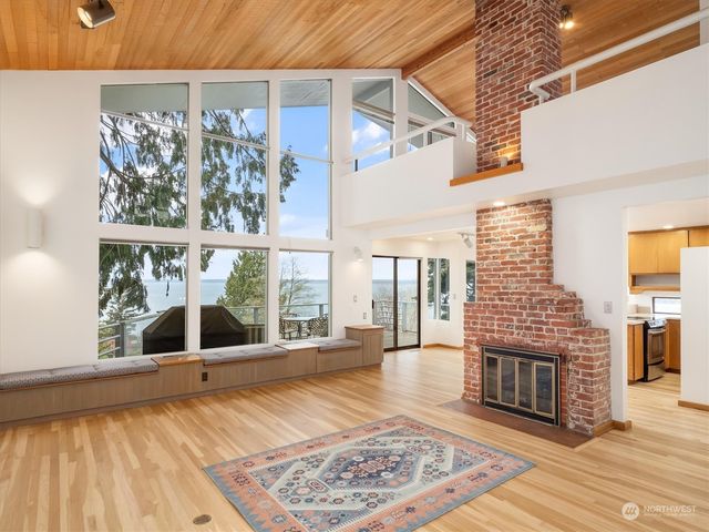 a view of a living room with a large window