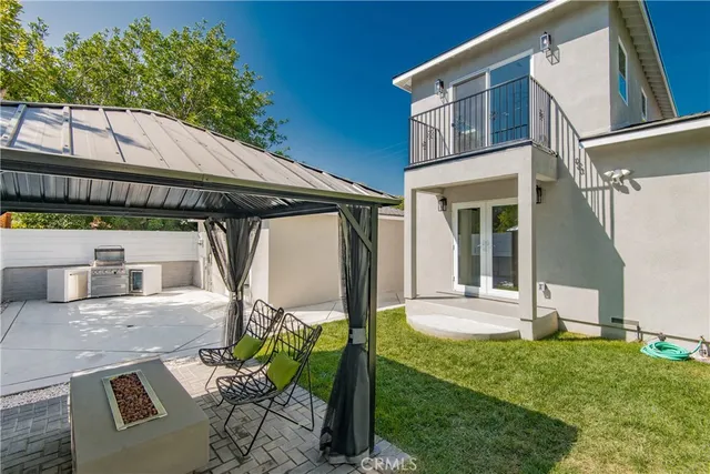 a house with garden in front of it