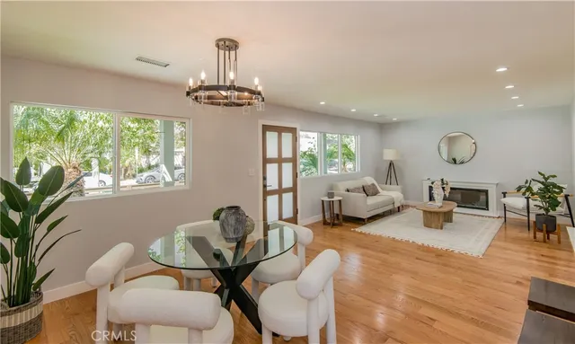 a living room with furniture or window and a chandelier