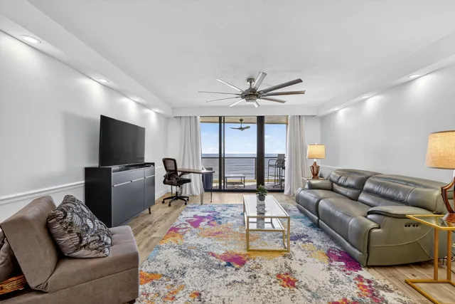 a bathroom with a toilet a sink and a mirror