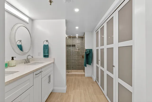 a bathroom with a sink and a mirror