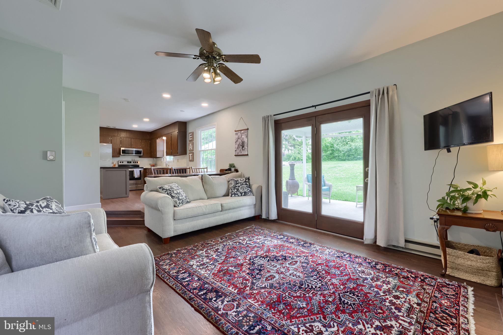 1019 Devonshire Road Lancaster, PA 17601 - Photo 13 of 35 a living room with furniture and a flat screen tv