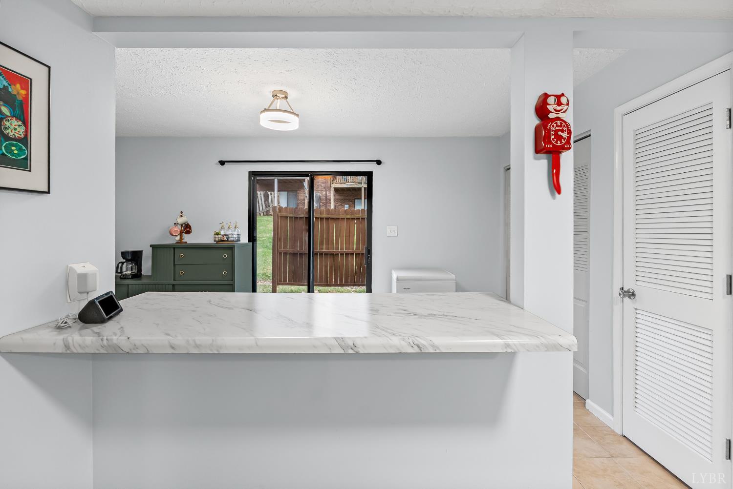 20 Cape Henry Court Lynchburg, VA 24502 - Photo 7 of 34 a bathroom with a granite countertop sink a vanity and a window