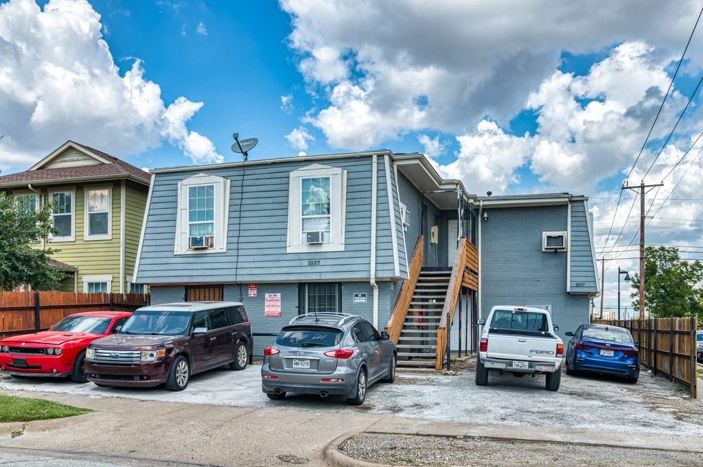 a car parked in front of a house
