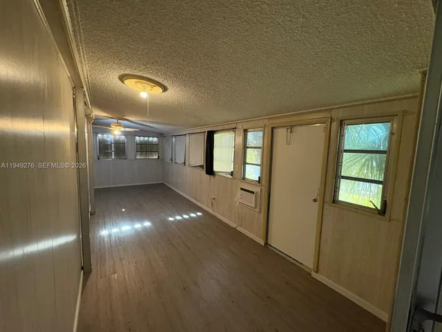 a view of gallery with windows