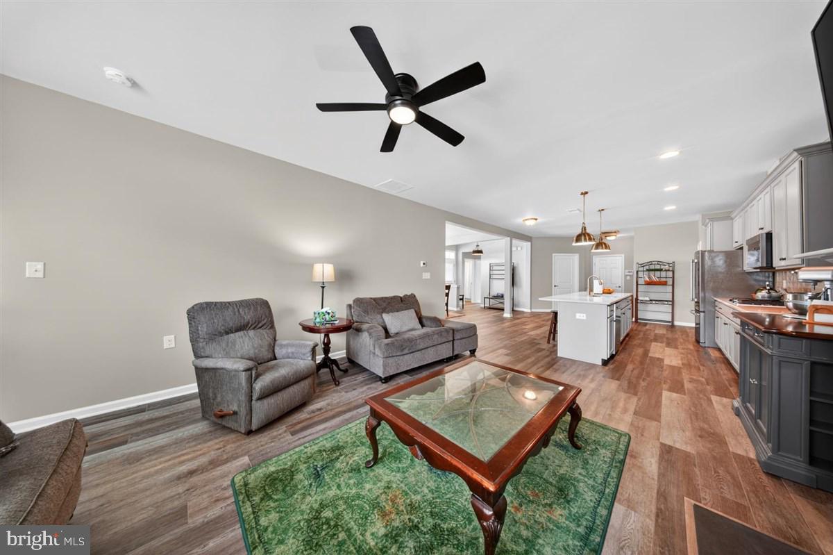 1426 Whispering Woods Road Middletown, DE 19709 - Photo 15 of 37 a living room with furniture