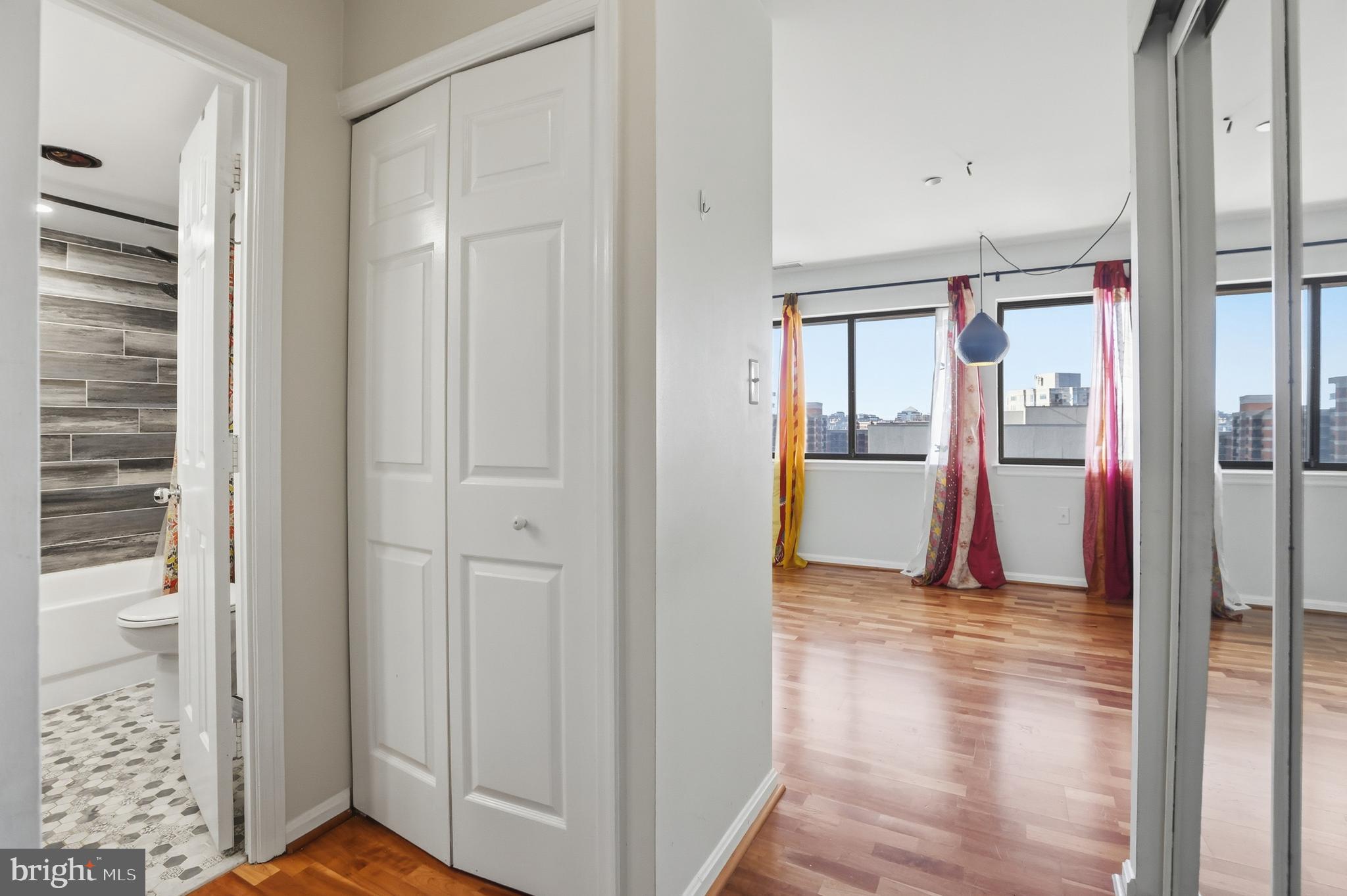 1301 North Courthouse Road, Unit 1804 Arlington, VA 22201 - Photo 23 of 29 a view of an entryway with wooden floor