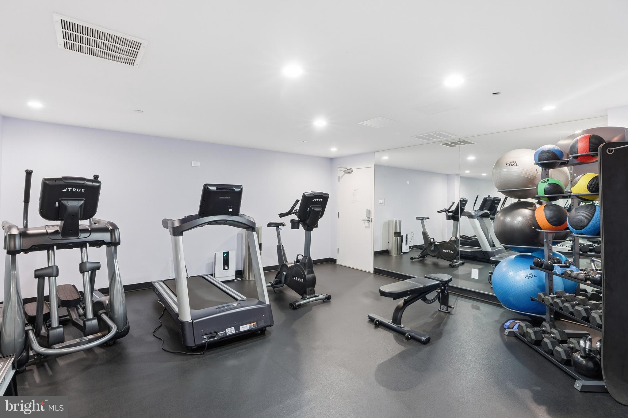 1301 North Courthouse Road, Unit 1804 Arlington, VA 22201 - Photo 28 of 29 a view of a room with gym equipment