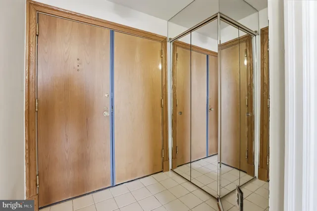 a view of a bathroom with white walls