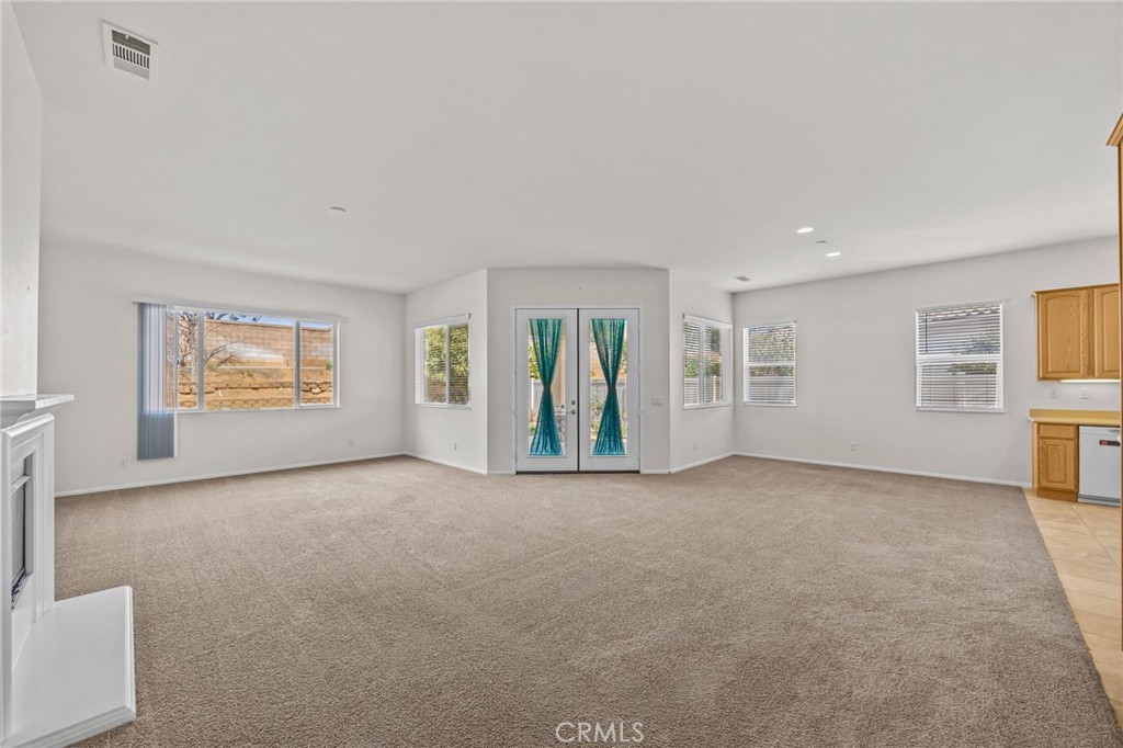 1140 Lantana Road Beaumont, CA 92223 - Photo 9 of 30 a view of an empty room with a window