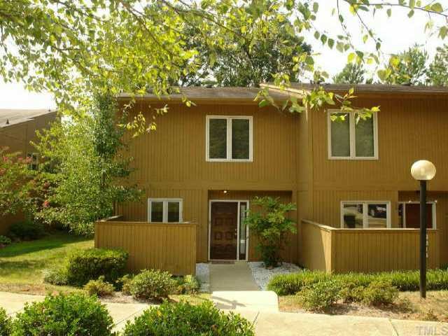 4211 Sunshadow Lane Raleigh, NC 27613 - Photo 1 of 10 a front view of a house with a yard